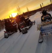 Snowmobile sunrise Photo L.Rynback